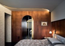 Contemporary-bedroom-with-concrete-and-wood-walls-217x155