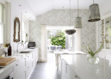 Contemporary-kitchen-in-white-looks-refined-even-with-a-paisley-wallpaper-in-gray-217x155