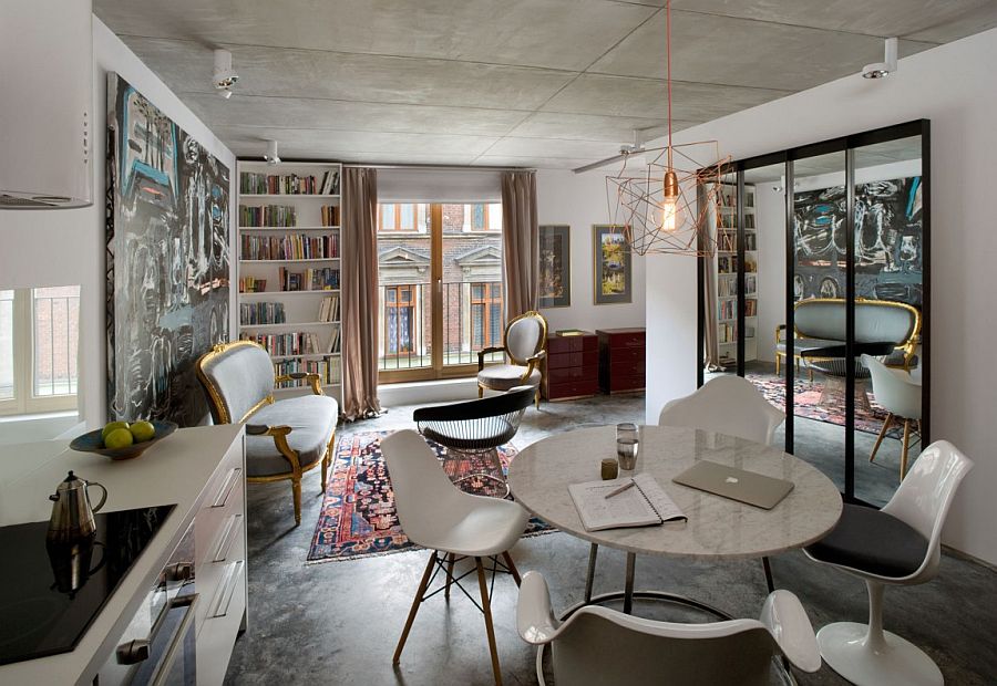 Exquisite and eclectic living room of Paris apartment with gold accents