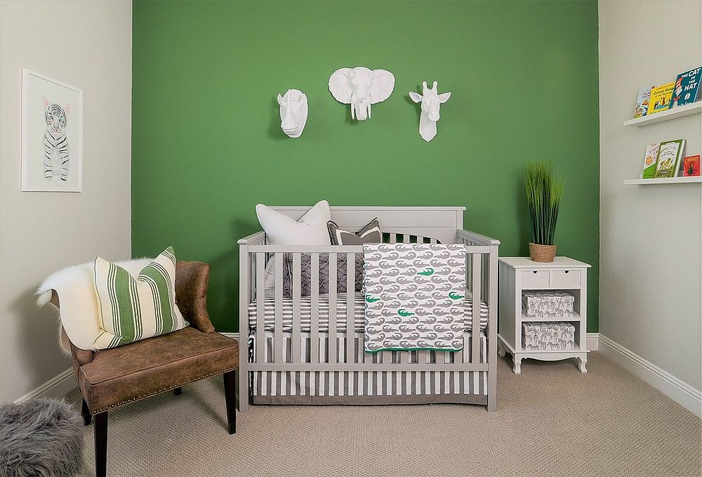 Farmhouse style nursery with green accent wall