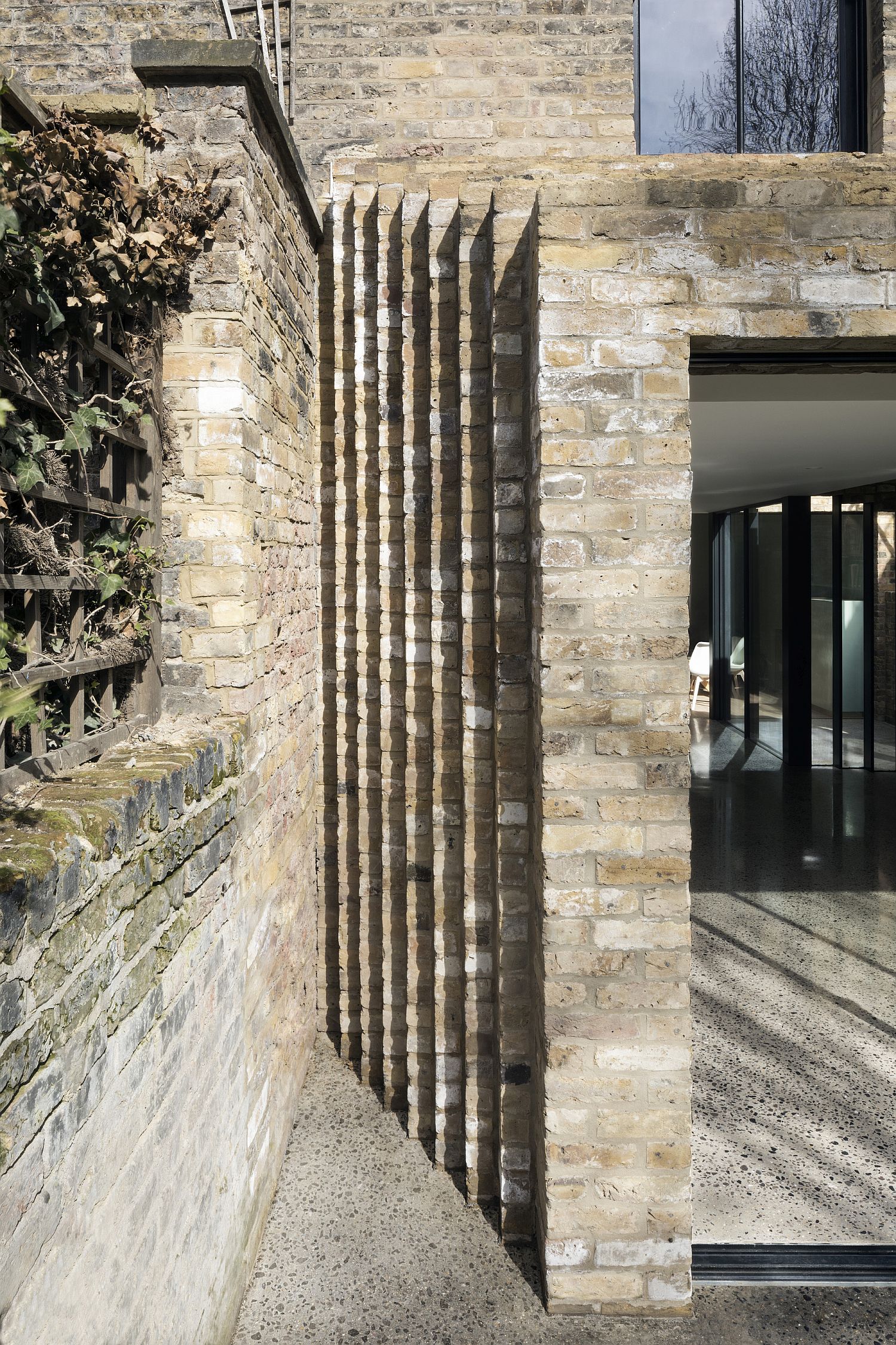 Gorgeous brick extension of the London home blends modern with the classic