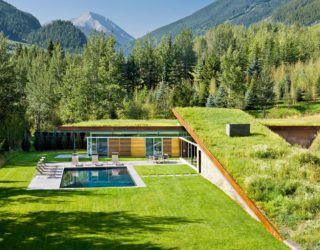 Camouflaged in a Cloak of Green: Majestic Eco-Friendly House in the Mountains