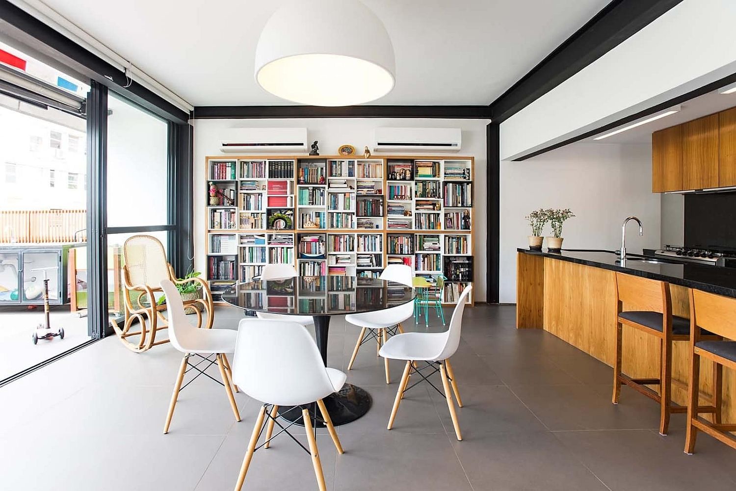 Metal, tile and wood create a warm and polished modern living room