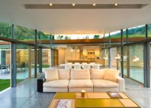 Pavilion-style-sitting-area-surrounded-by-glass-walls-and-sliding-glass-doors-217x155