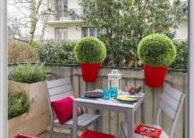 Planters-on-the-rail-and-tiny-table-and-chairs-transform-the-small-balcony-into-a-cool-hangout-217x155