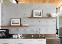 Single-wall-kitchen-idea-with-a-concrete-wall-217x155