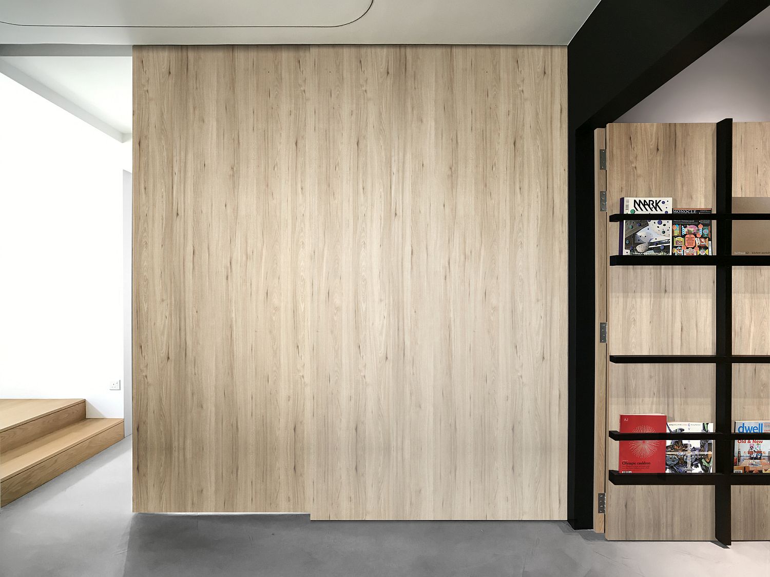 Sliding partitions and walls help shape a flexible and multi-tasking apartment