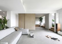 Sliding-wooden-partitions-help-delineate-space-inside-the-apartment-217x155
