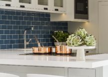 Stylish-contemporary-kitchen-with-blue-tiled-backsplash-217x155