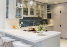 Subway-Tile-Backsplash-adds-color-to-the-kitchen-in-white-217x155