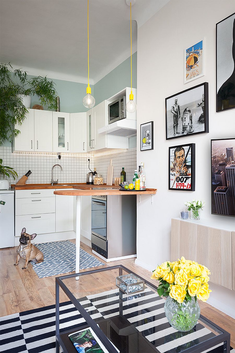 Tiny kitchen in white with pops of yellow to enliven it