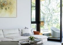 White-interior-of-the-contemporary-home-with-metal-and-glass-frame-217x155
