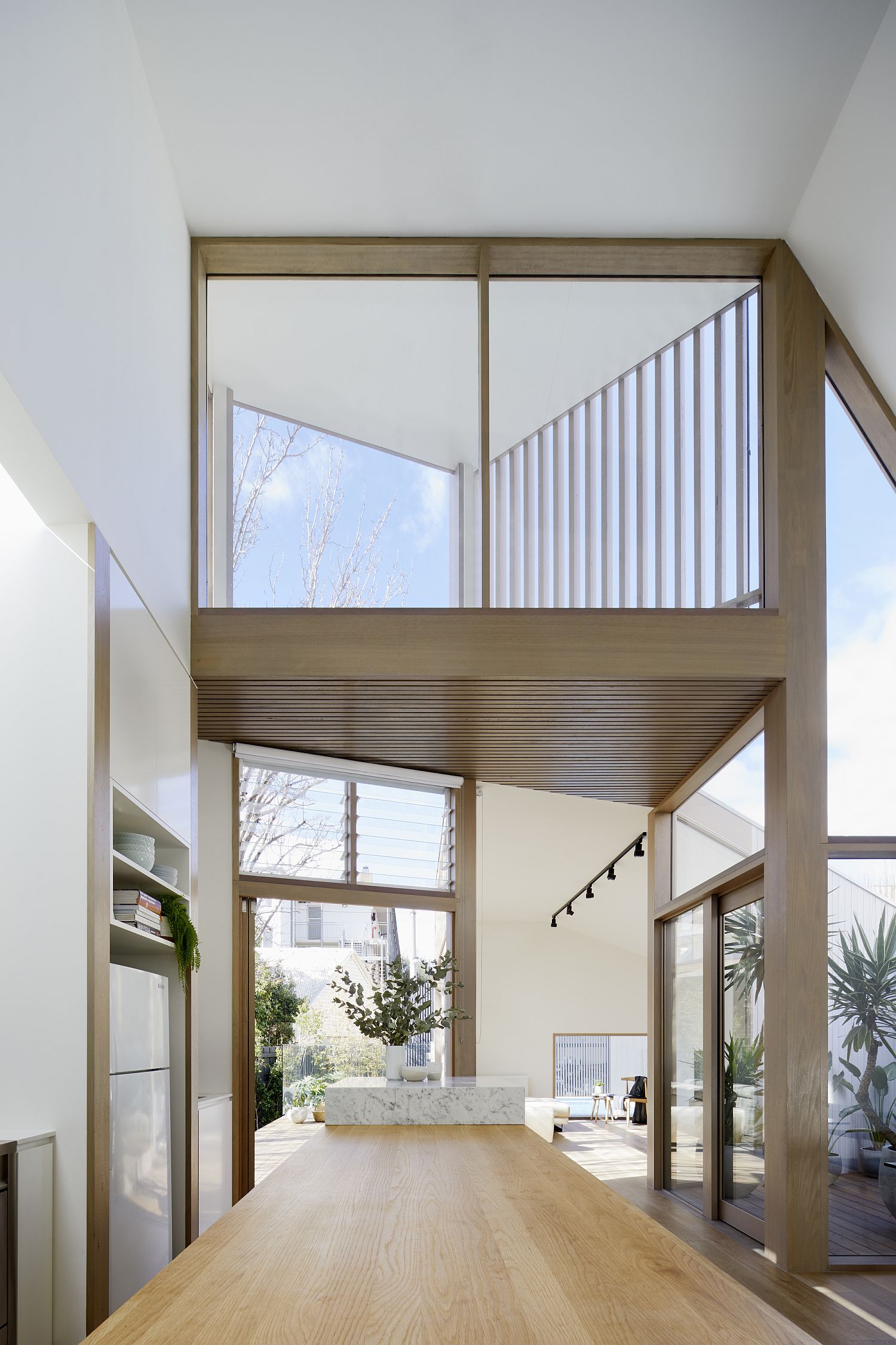 Windows and doors in glass bring in ample natural light
