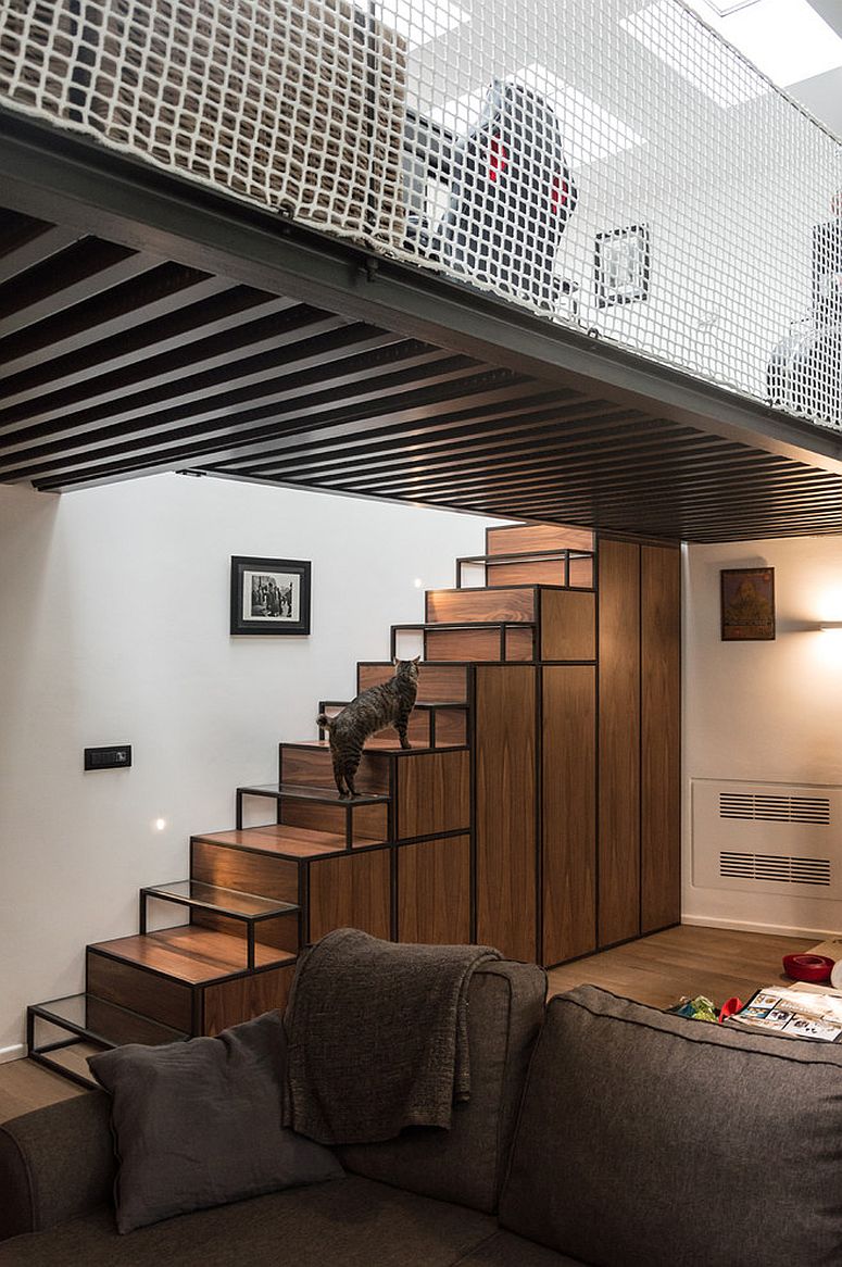 Box-style stairway inside the small apartment with plenty of storage space inside