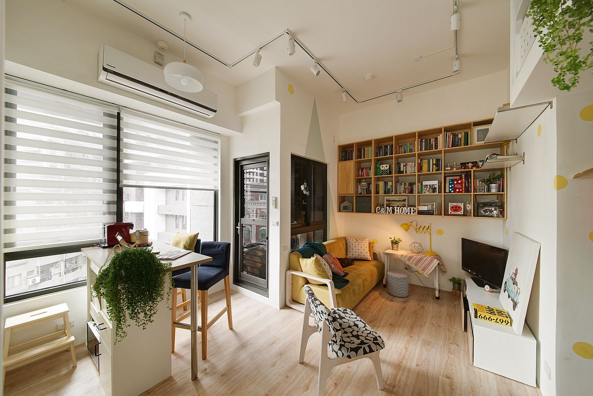 Breakfast nook and tiny dining area rolled into one inside this urban apartment