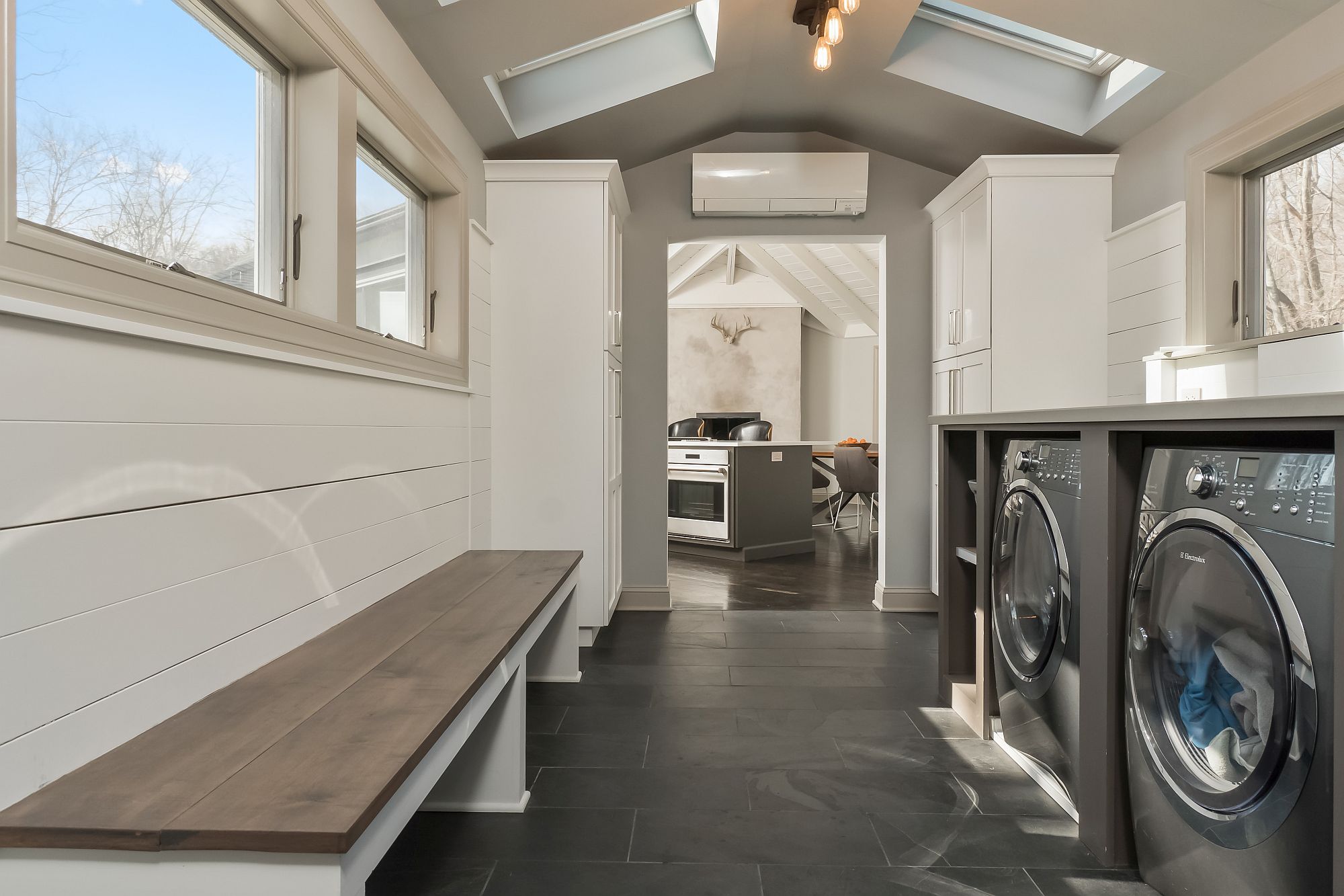 Combine the mud room and laundry area in style