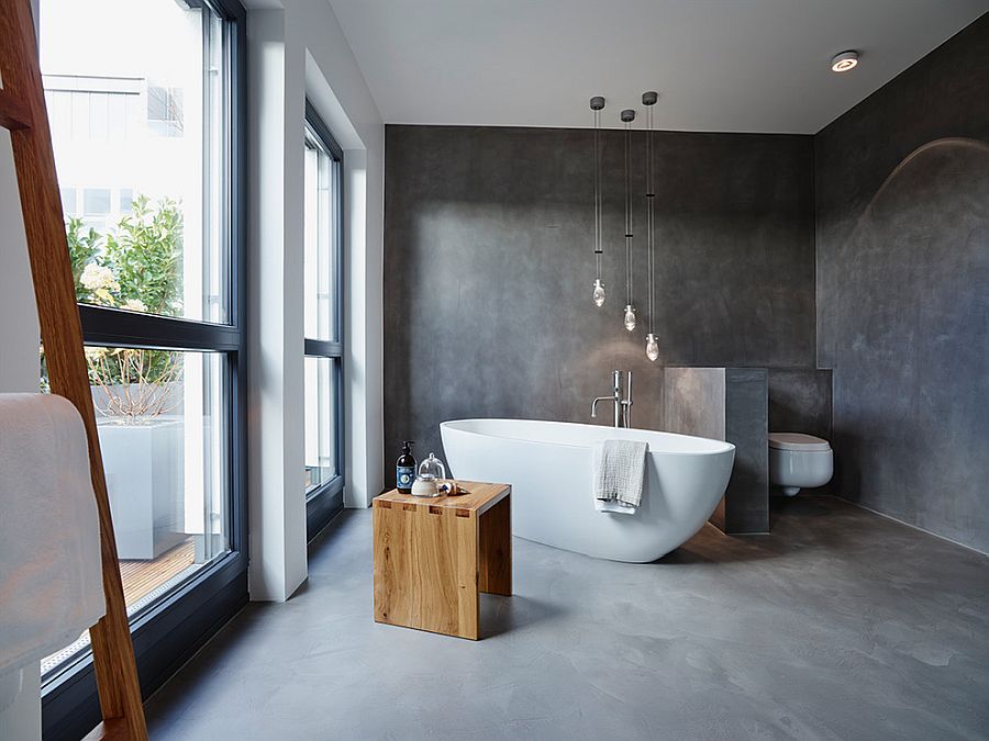 Contemporary bathroom with custom plaster finish that mimics concrete visually