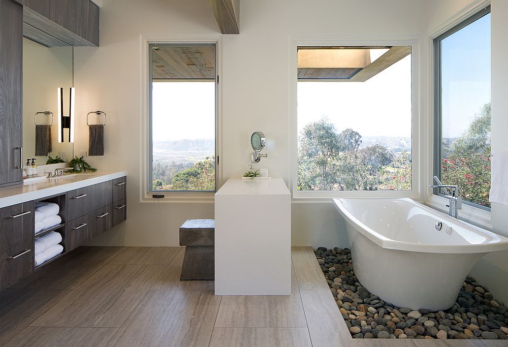 Contemporary bathroom with river rocks that create a unique visual