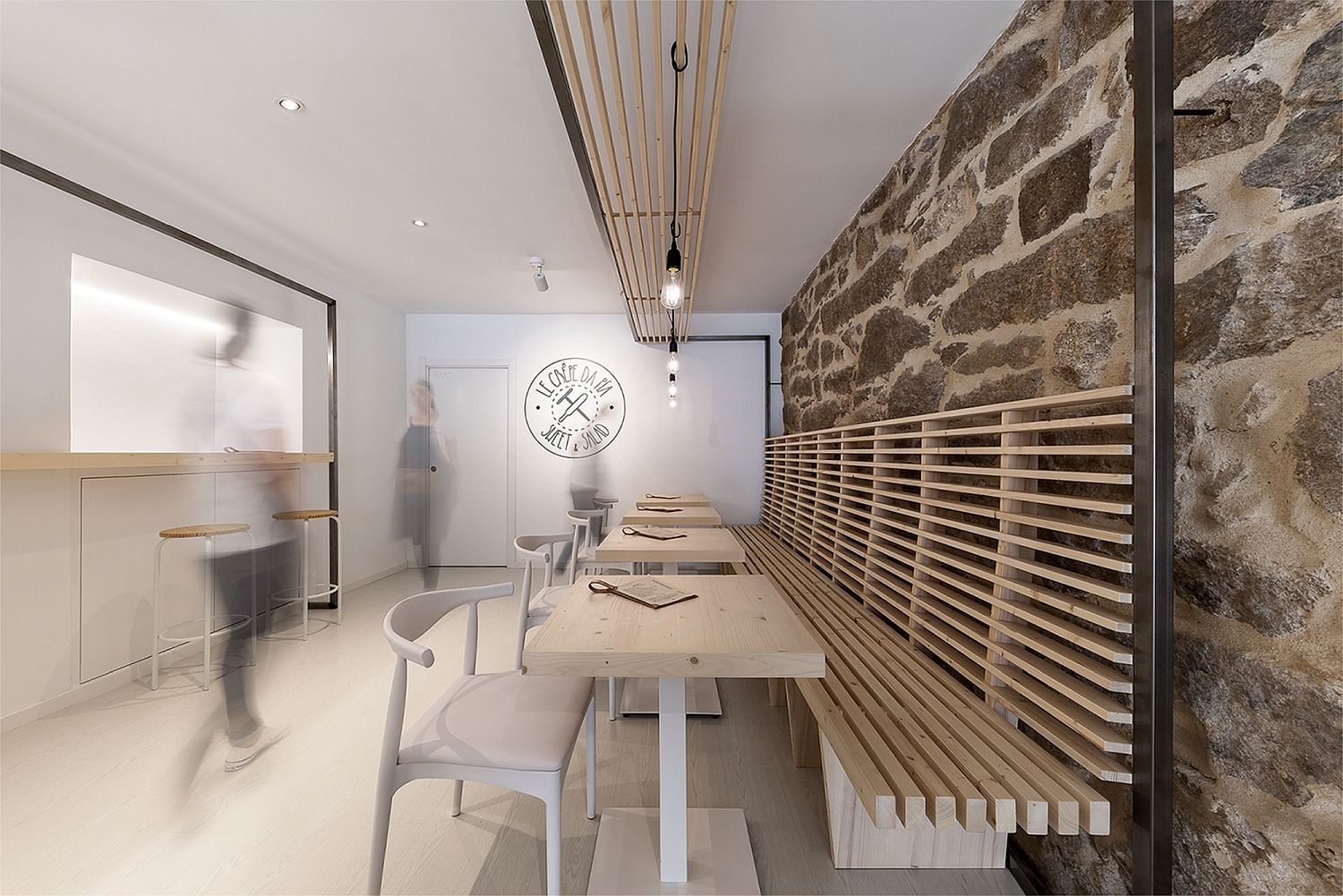 Cozy and space-savvy wooden seating inside the tiny Spanish restaurant