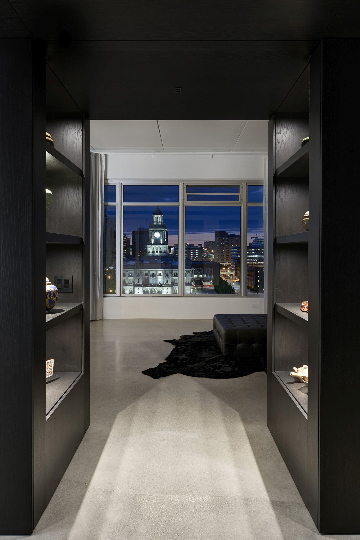 Dark-wooden-shelves-of-the-apartment