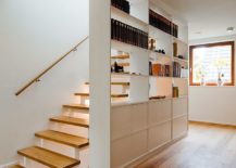 Finding-space-next-to-the-stairway-for-a-smart-modern-shelf-and-cabinet-217x155