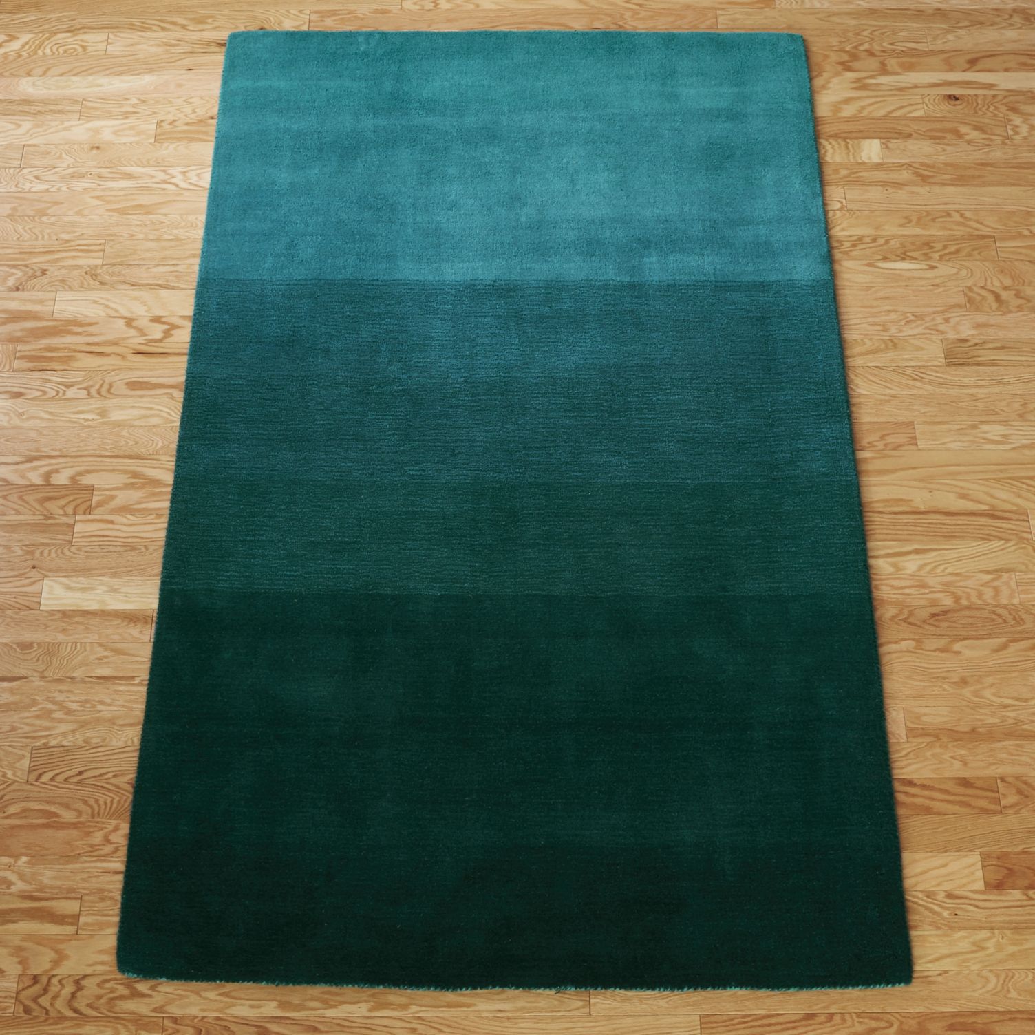 Gradient teal rug