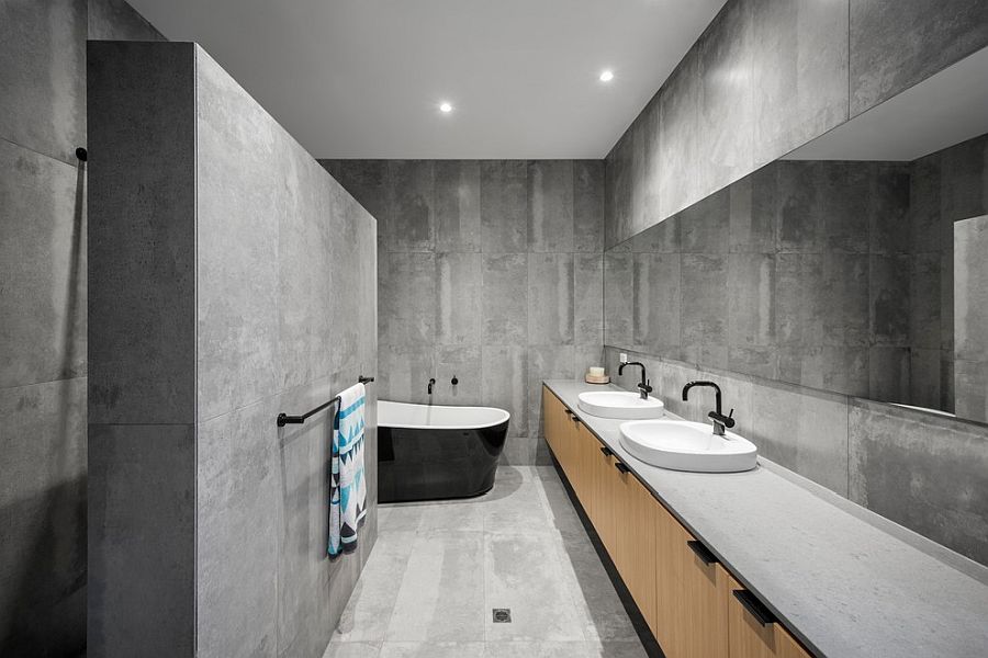 Spa-styled-minimal-bathroom-with-a-captivating-black-bathtub