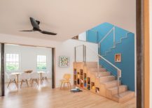 Staircase-storage-units-help-shape-a-lovely-play-area-next-to-the-dining-room-217x155
