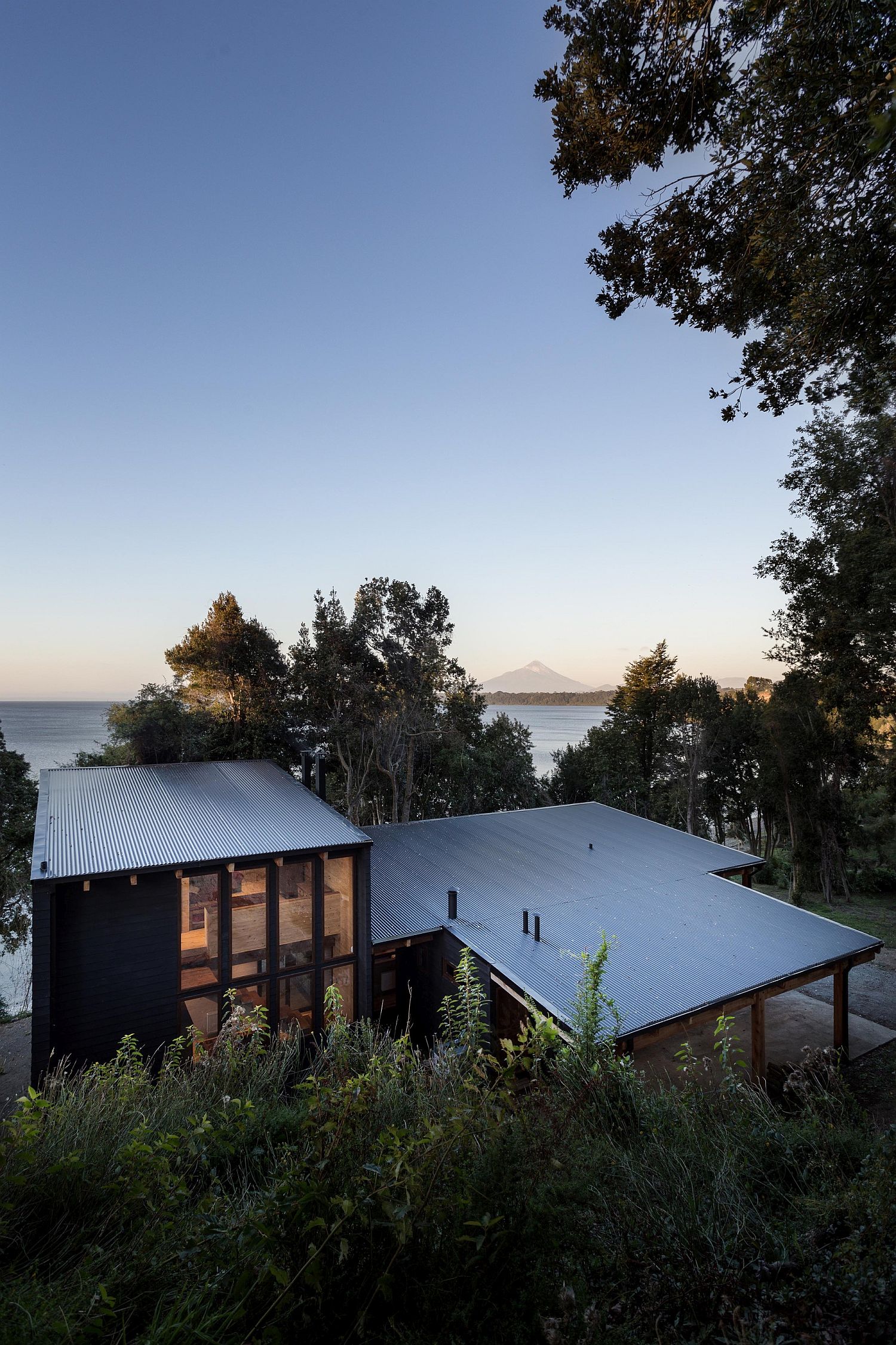 Stunning contemporary home in Chilean Patagonia with a gorgeous lake next to it