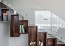 Wooden-boxes-turn-the-space-under-the-stairway-into-a-cool-display-217x155