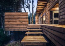 Wooden-steps-leading-to-the-extensive-deck-around-the-home-217x155