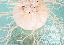Beachy-centerpiece-with-real-and-faux-coral-217x155