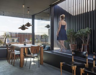 Wrap-Around Terrace Creates Urbane Floating Penthouse in Berlin