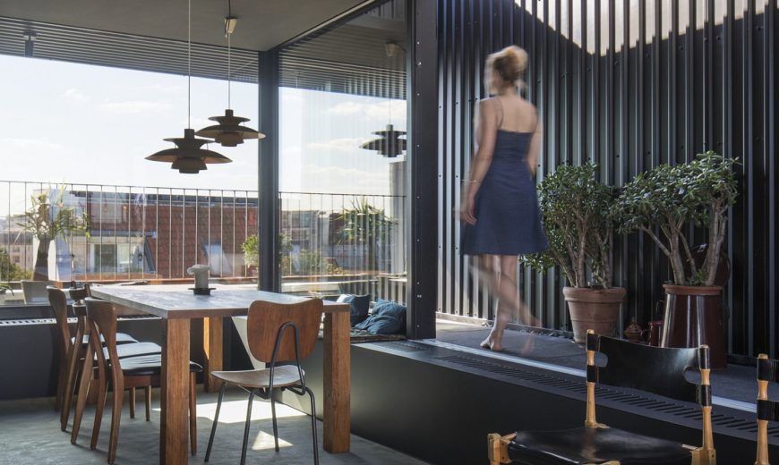 Wrap-Around Terrace Creates Urbane Floating Penthouse in Berlin