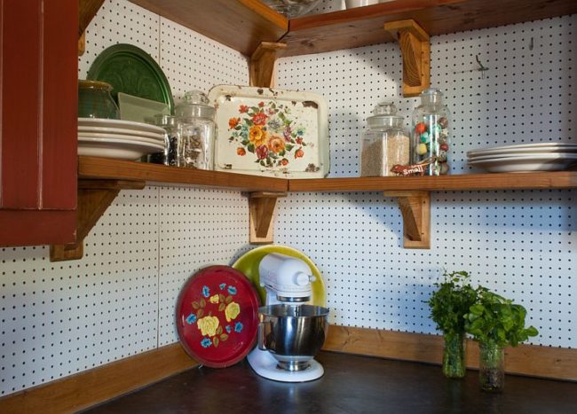 Kitchen Pegboard Ideas Transforming Storage Options And Saving Space   Corner Of The Rustic Kitchen Turned Into Storage Space Using Pegboard On The Walls 650x467 