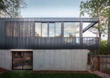 Dark-black-and-concrete-exterior-of-the-contemporary-home-217x155