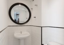 Dark-framed-mirror-and-retro-sink-for-the-tiny-toilet-217x155