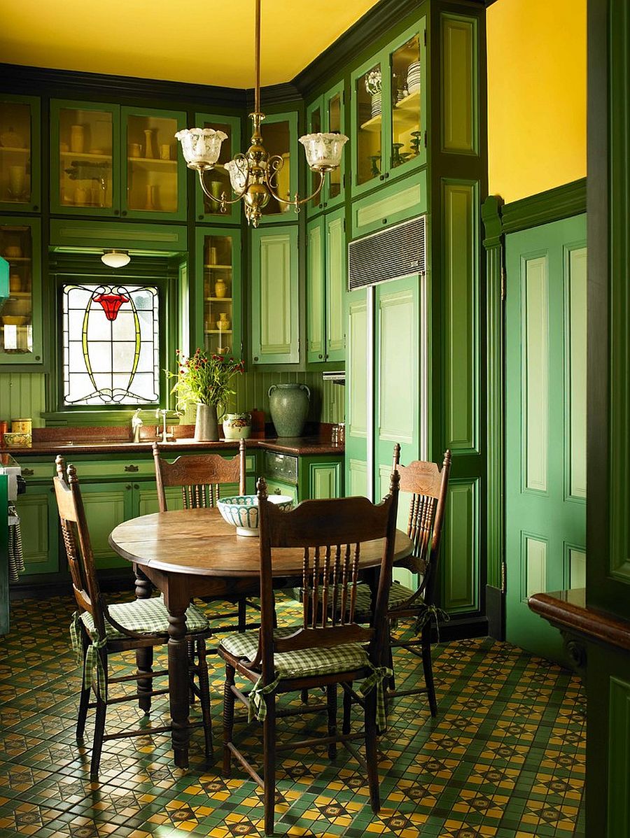 Dark green and yellow dining room with Victorian style