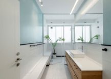 Fabulous-white-and-blue-bathroom-with-wooden-vanity-217x155