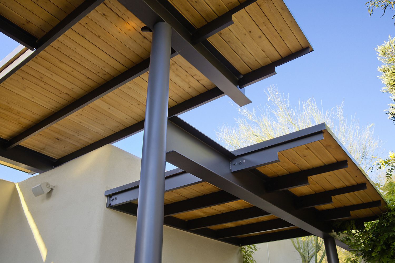 Metal and wood canopy for the outdoor living space