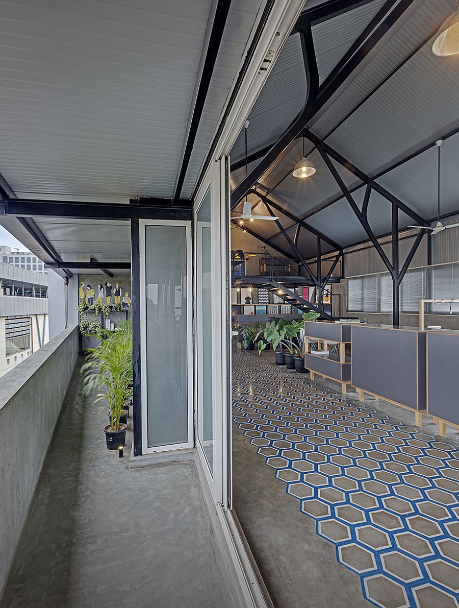 Old industrial attic converted into a dashing modern office