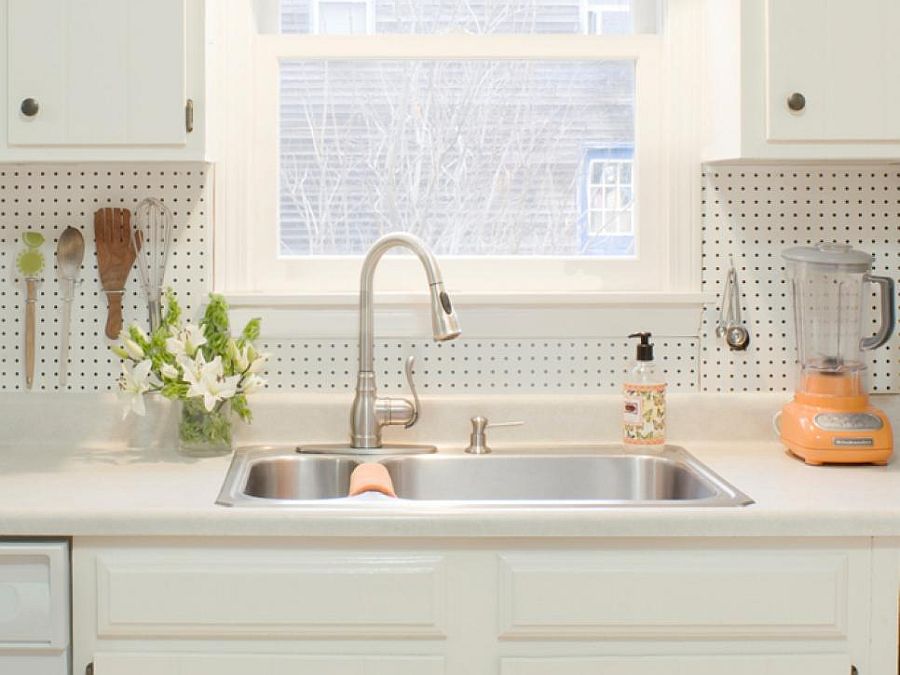 Pegboard kitchen basksplash combines modernity with storage options
