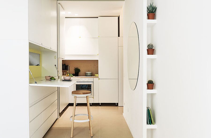 Small fold-out work desk and dining space inside the small apartment