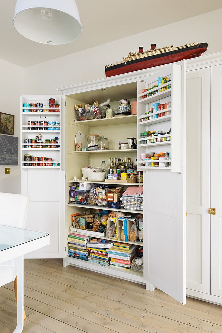 Tucking-away-excess-kitchenware-and-supplies-intothe-pantry-gives-the-kitchen-an-organized-look