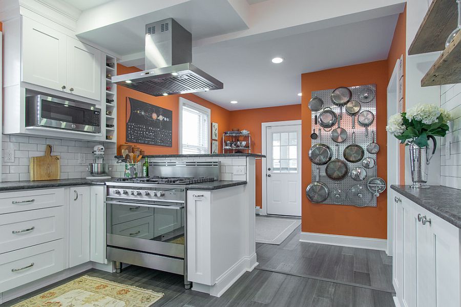 White-kitchen-with-pops-of-orange-and-metal-pegboard