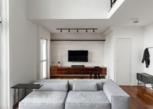 Whitewashed-accent-brick-wall-for-the-living-room-TV-wall-217x155