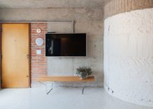 Brick-concrete-and-polished-modern-finishes-combine-inside-the-Sao-Paulo-apartment-217x155