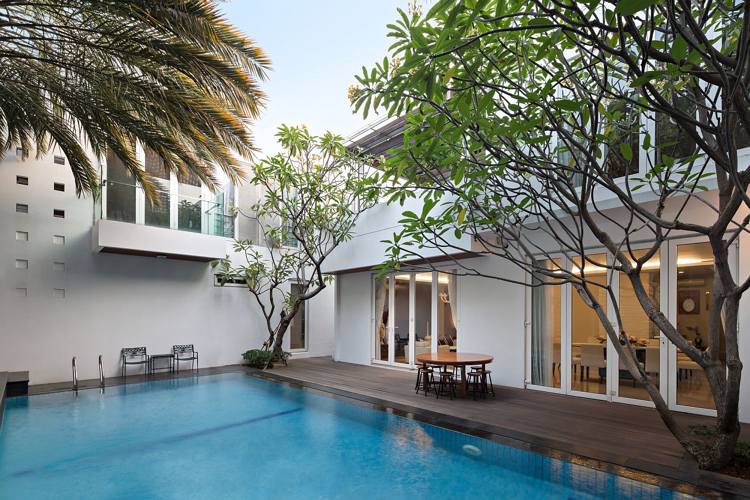 Designing-two-houses-on-the-same-lot-with-common-pool-and-courtyard