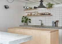 Elegant-stone-and-wooden-islands-for-the-light-filled-modern-kitchen-217x155