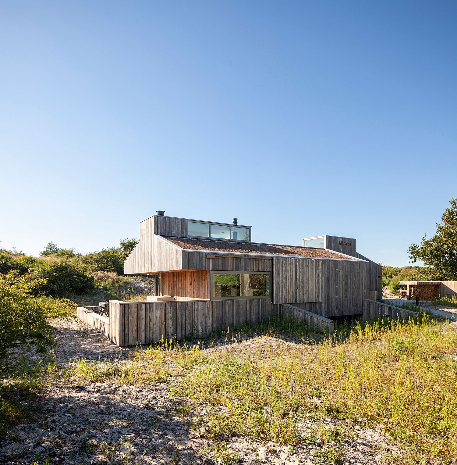 Exterior of the Holiday home is modest with an underground bedroom level